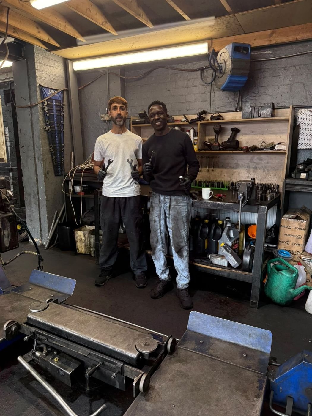 Ahmad Mobile Mechanic team with tools in the workshop, Sheffield